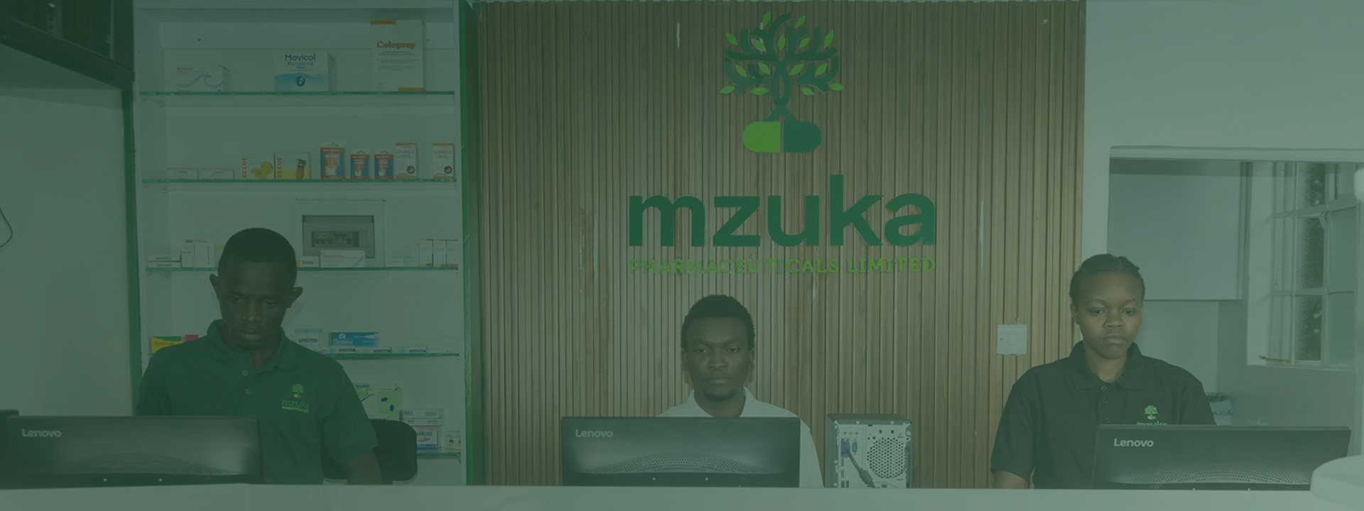 The Mzuka Pharmaceuticals team at the pharmacy counter